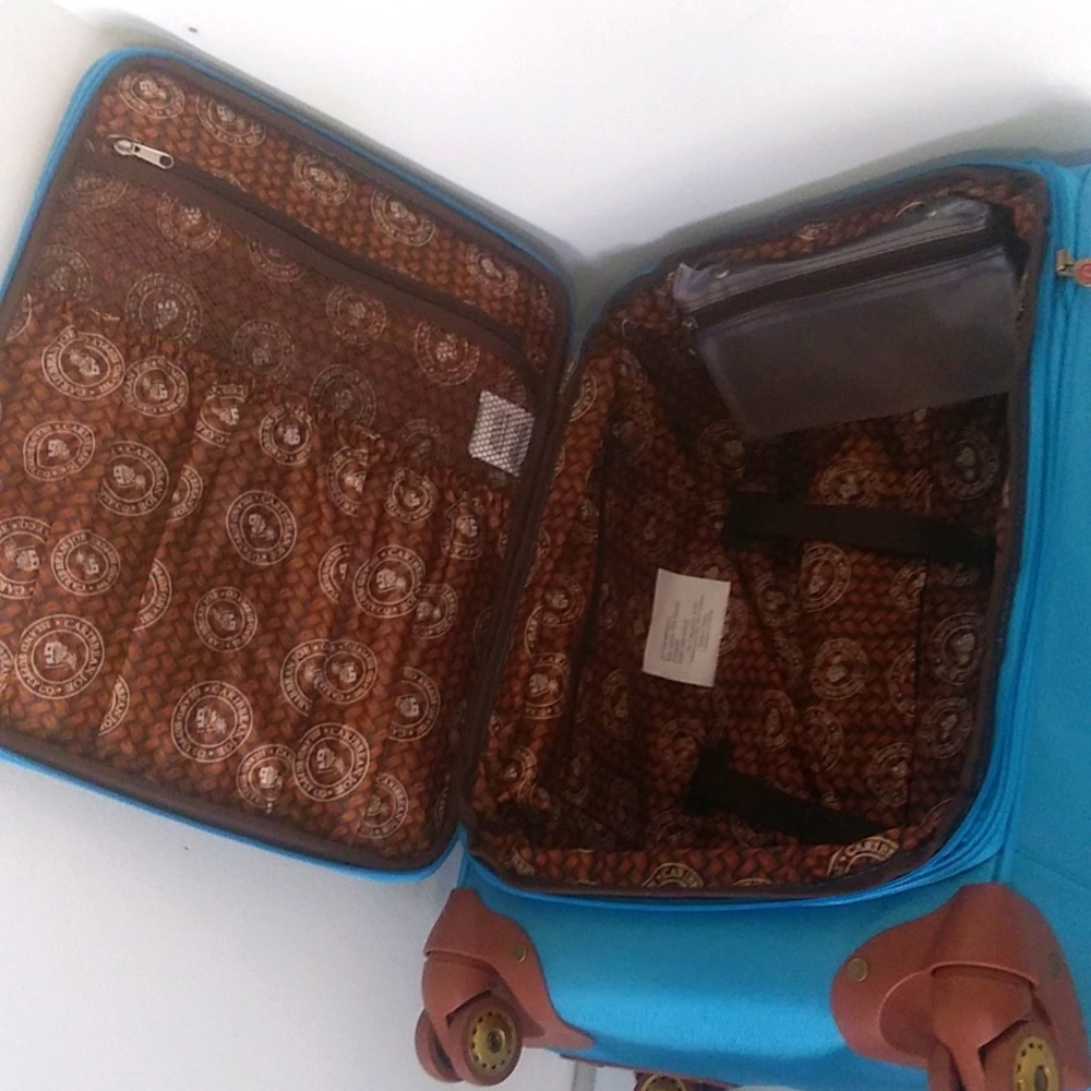 Softside, 20 Inch 8 Wheel Spinner Carry-On, Light Blue. - Picture 9 of 14